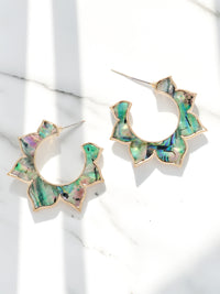 Floral shaped abalone shell hoop earrings.