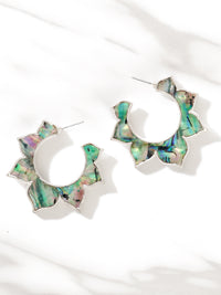 Floral shaped abalone shell hoop earrings.