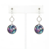 Silver-tone drop earrings with round abalone shell inlays and circular link accents.