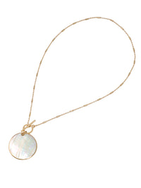 Gold chain necklace with a round Mother of Pearl shell pendant and toggle clasp closure.
