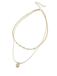 Gold double-layered necklace with a puffy crystal-paved teardrop charm, featuring a snake chain and a paperclip chain design.