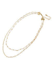 An elegant double-layered pearl necklace featuring a sophisticated paperclip chain in a radiant gold finish, combining classic pearls with modern design for a timeless and stylish accessory.