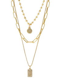 A triple-layered gold necklace featuring various chains adorned with modern, paved charms.