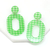A pair of striped resin drop and dangle earrings in light green color.
