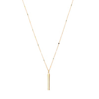 A simple  skinny bar charm short necklace in gold.