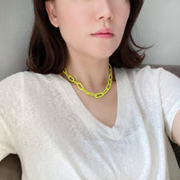 Featuring a stunning paperclip chain short necklace in a pop of vibrant neon yellow color to your outfit.