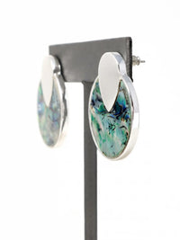 Silver-tone round disc stud earrings with colorful iridescent abalone shell inlay in blue, green, and pink by Bauble Sky