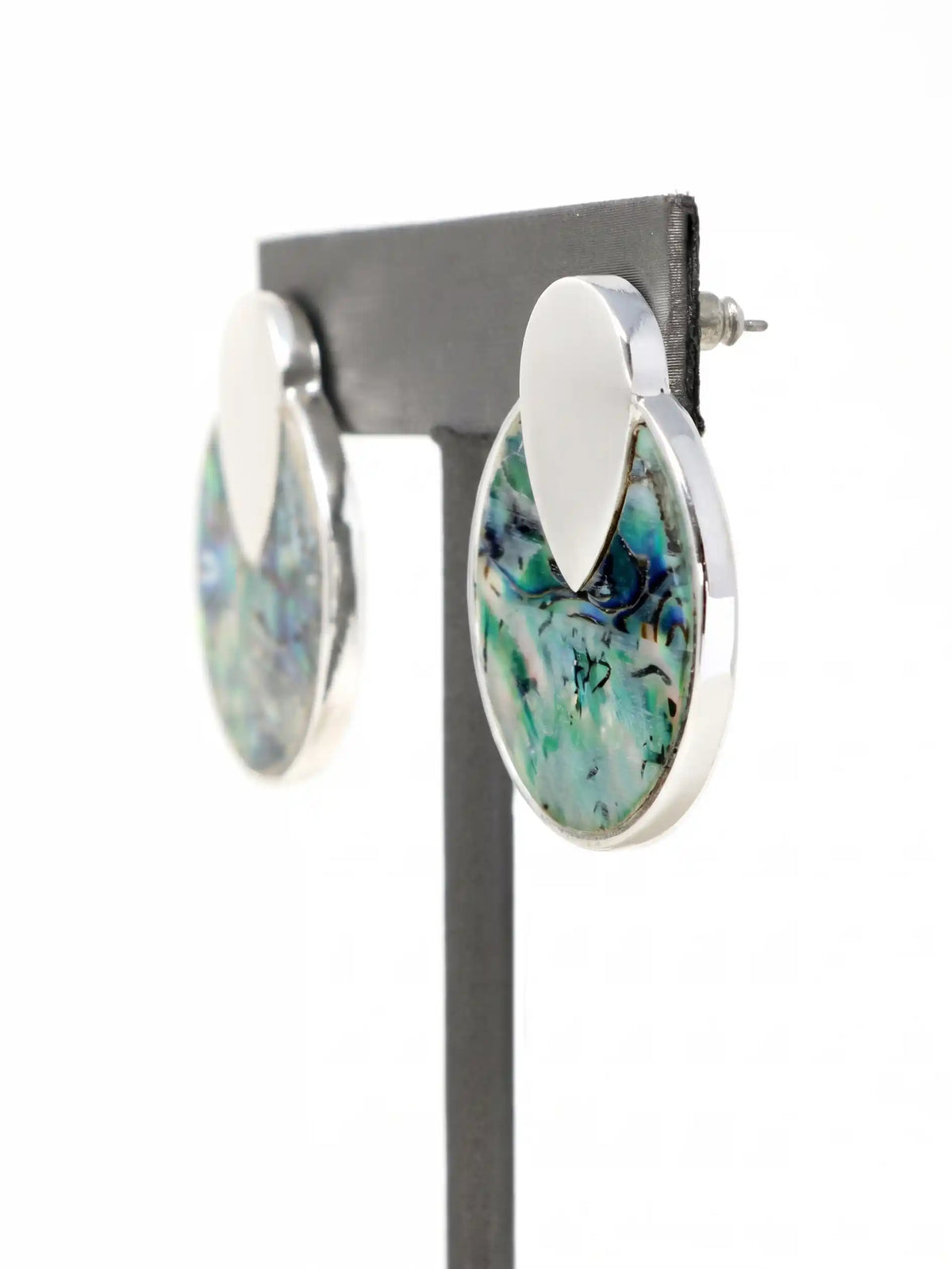Silver-tone round disc stud earrings with colorful iridescent abalone shell inlay in blue, green, and pink by Bauble Sky