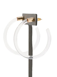 Pair of clear Lucite hoop earrings by Bauble Sky featuring polished transparent resin, gold-tone accents, and a modern minimalist design.