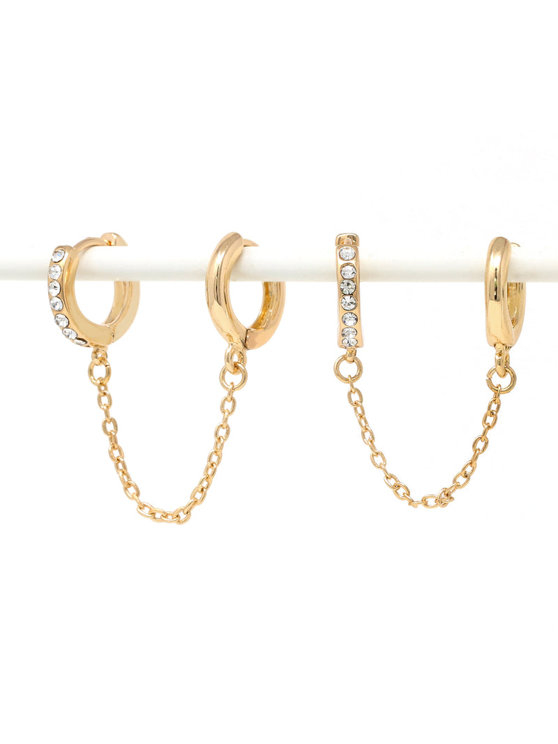 Paved modern loop earplug earrings in gold connected with chains.
