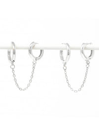 Silver hoop earrings with chain extensions on a white background