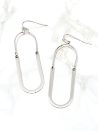 Silver u-shape metal drop and dangle earrings on a white background
