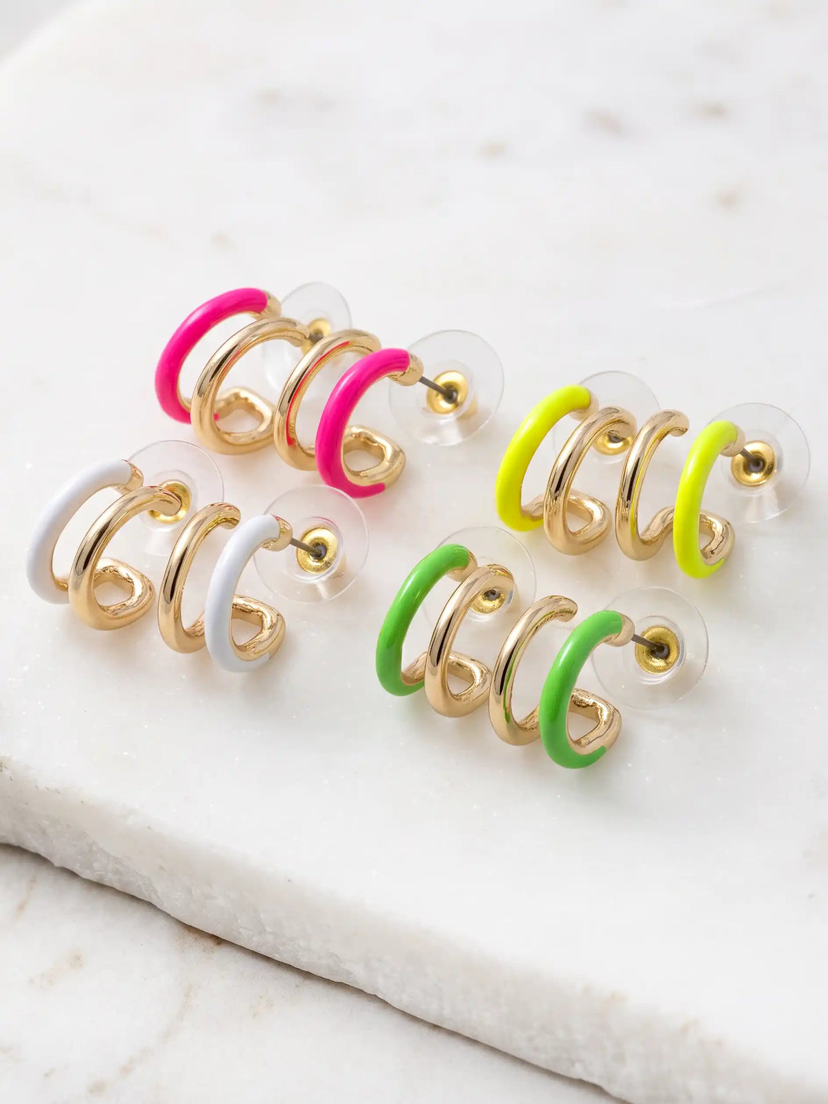 Four pairs of gold-plated double hoop earrings with vibrant neon-colored accents in yellow, pink, green, and white, featuring a modern 15mm design.
