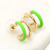 Double hoop earrings featuring neon green and metal hoops for a bold and stylish look.