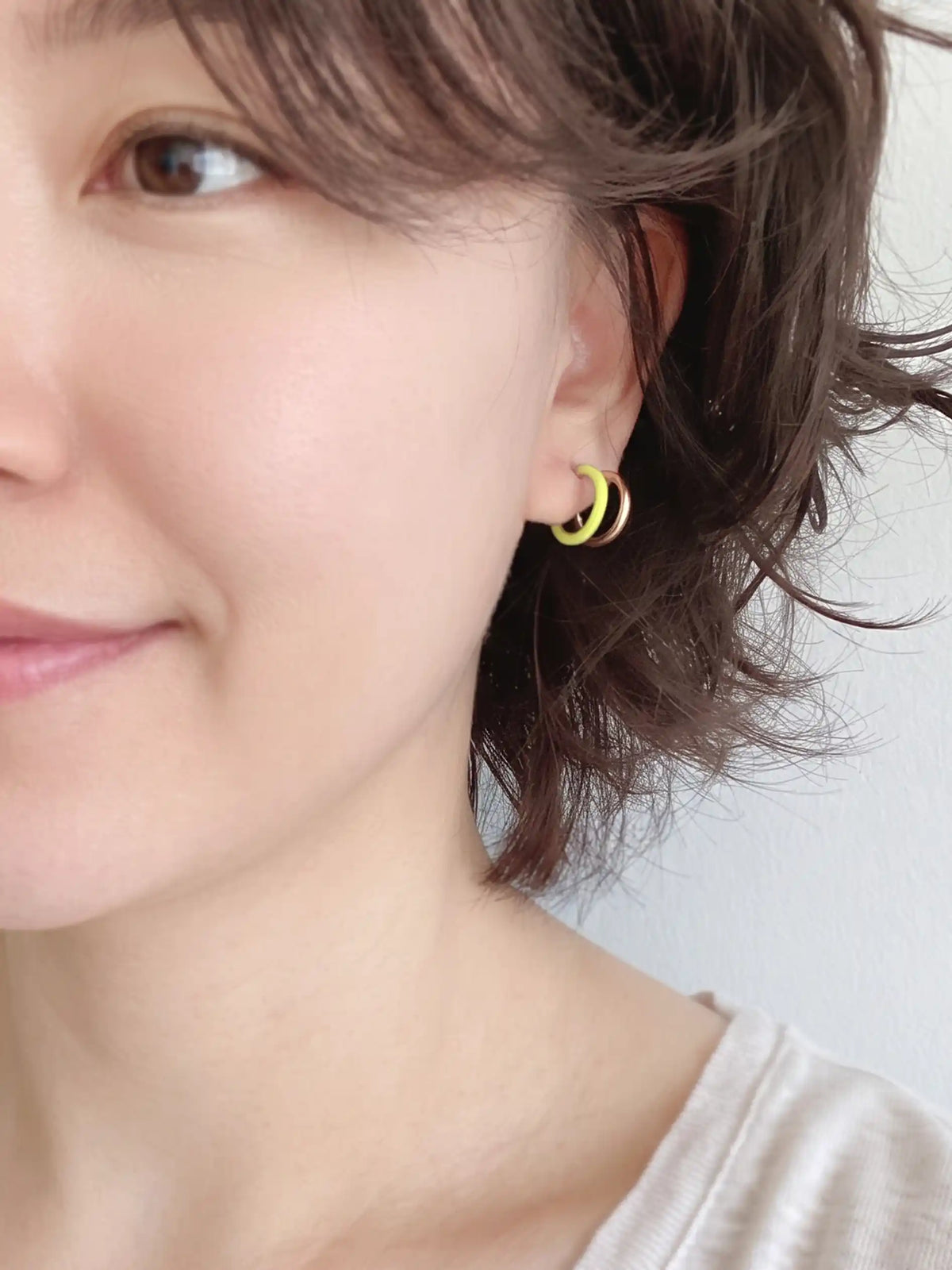 Gold-plated double hoop earrings with vibrant neon-colored accents in neon yellow featuring a modern 15mm design.