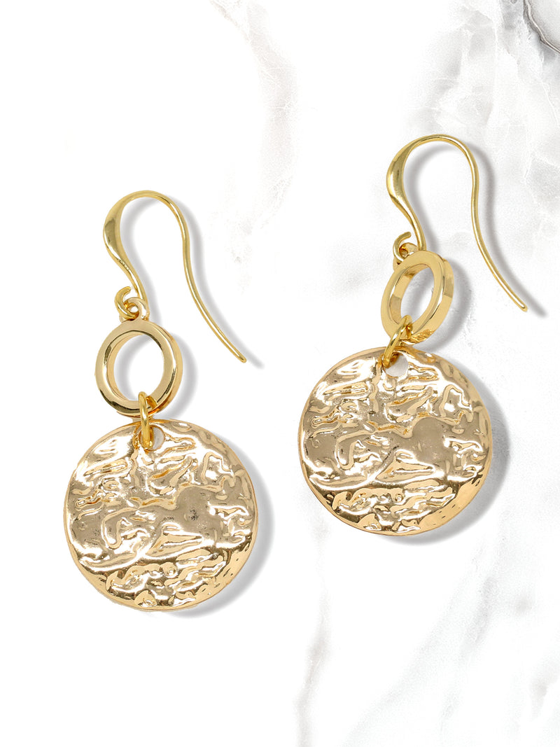 A pair of hammered charm drop and dangle earrings in gold.