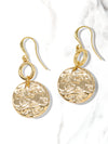 A pair of hammered charm drop and dangle earrings in gold.