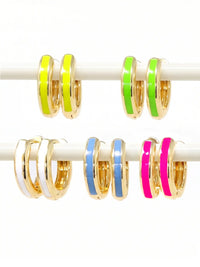 Five pairs of 15mm gold-plated huggie hoop earrings with a vibrant neon yellow, geen, pink, white, and tranquil blue epoxy color accent on one side.