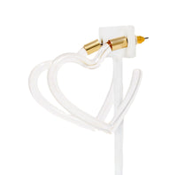 A pari of heart shaped hoop earrings feature a sleek and polished transparent resin that catches the light beautifully.