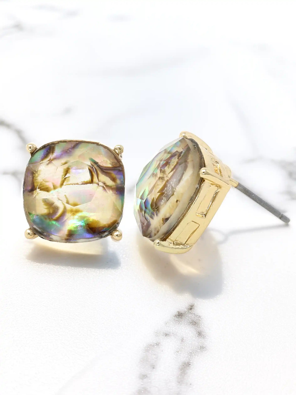 Natural abalone shell stud earrings with iridescent colors and faceted clear stones, available in gold.
