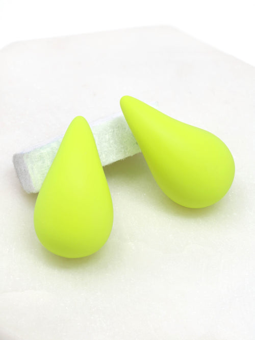 A close-up of neon puffy hollow teardrop earrings, showcasing their modern and minimalist design. The earrings make a statement with their sleek metal construction and distinctive shape.