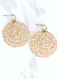 Lightweight round filigree metal drop and dangle earrings featuring an intricate openwork circular design in a gold-tone finish.
