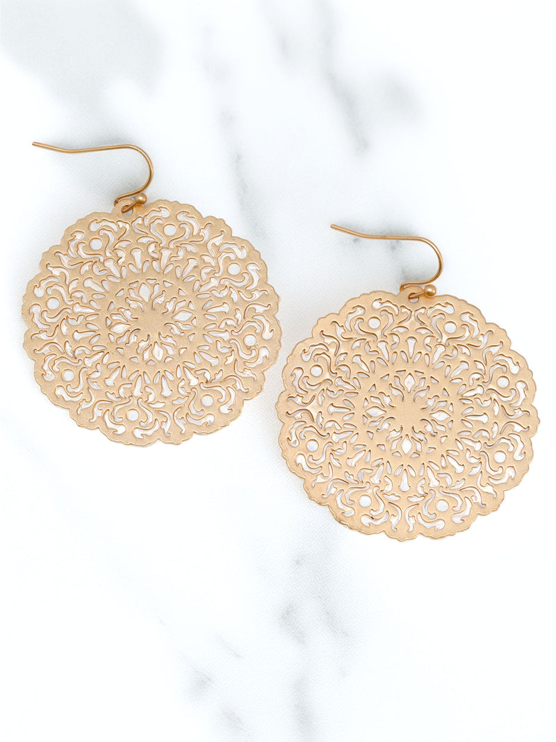 Lightweight round filigree metal drop and dangle earrings featuring an intricate openwork circular design in a gold-tone finish.