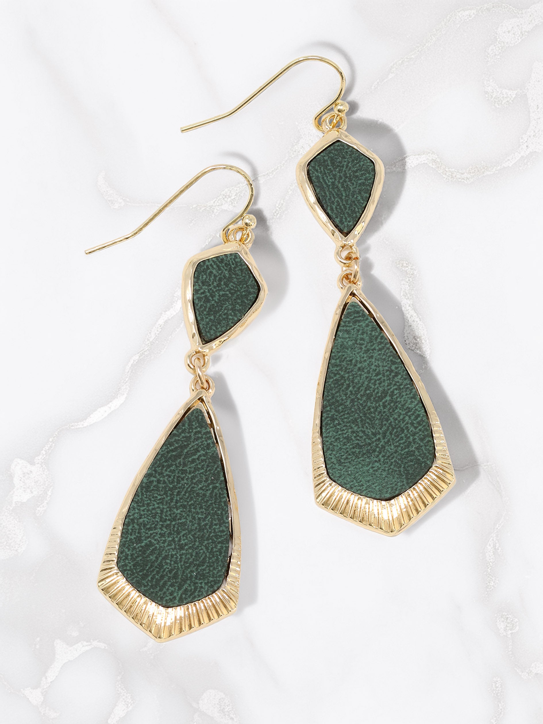 Green teardrop earrings with gold accents on a white background