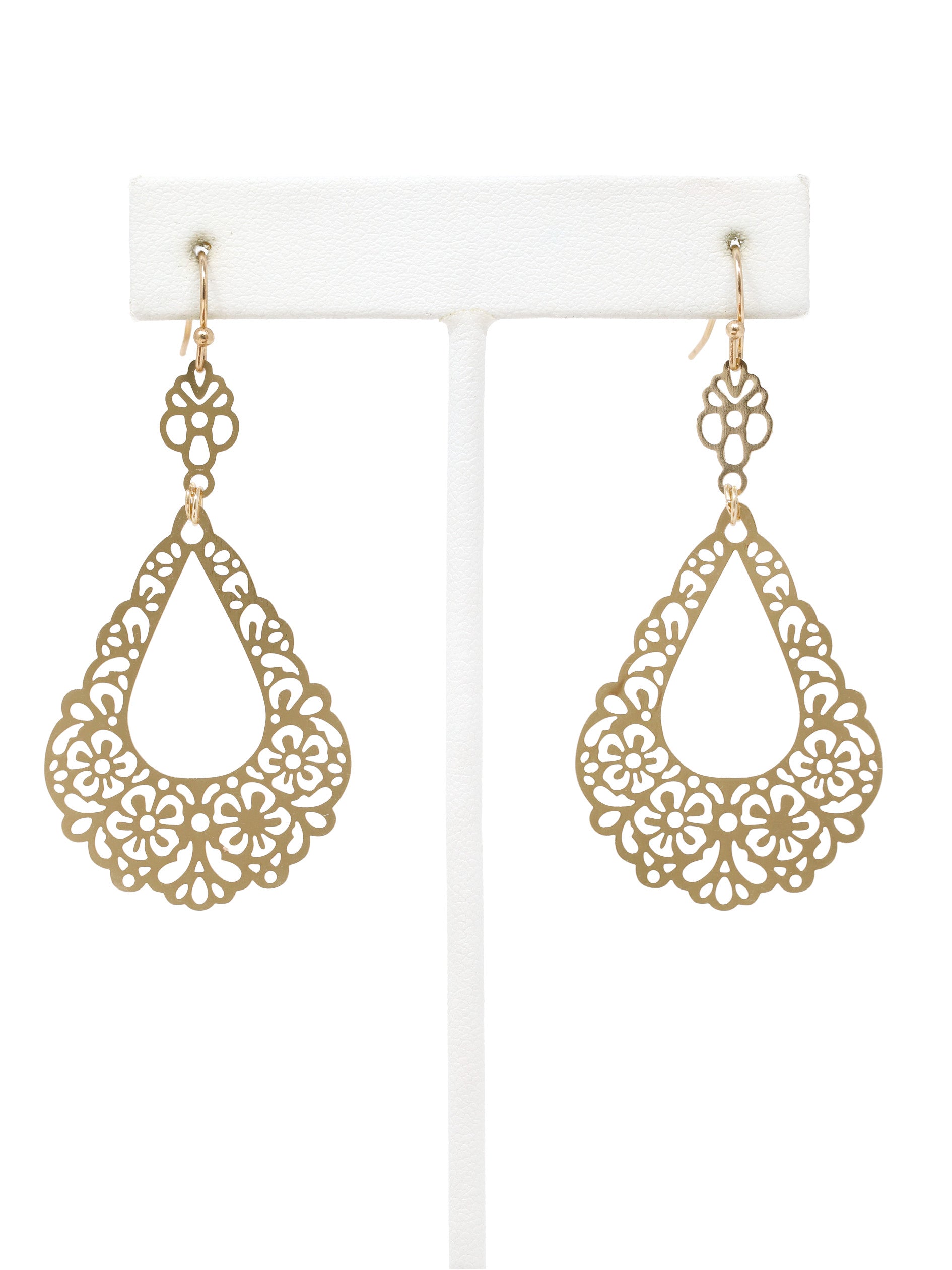 Gold filigree teardrop earrings on a white background