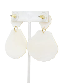 White earrings on a white background