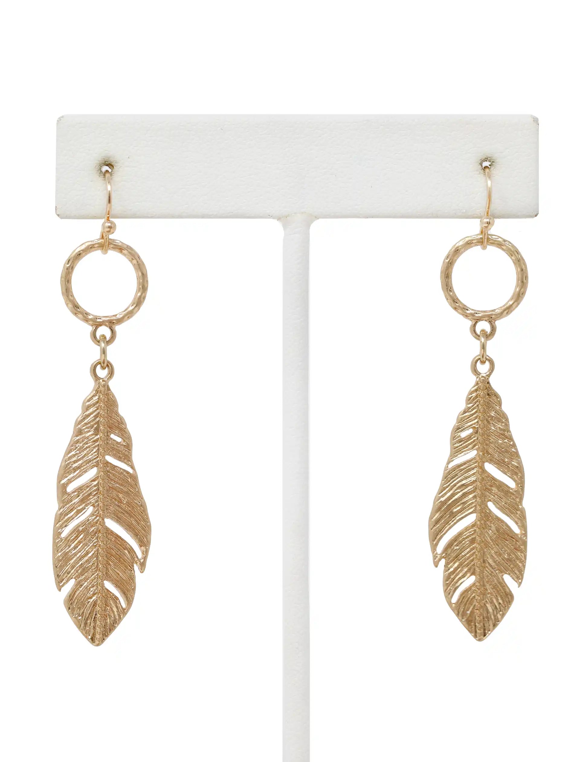 Gold leaf drop dangle earrings with textured circular links and detailed cutout leaf pendants.
