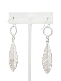 Silver leaf drop dangle earrings with textured circular links and detailed cutout leaf pendants.