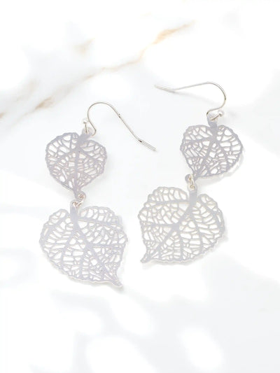Silver leaf-shaped earrings on a white background