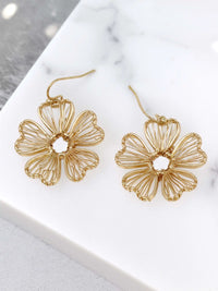 Gold wire flower drop earrings with open petal design and hook closure, featuring delicate floral filigree style in a lightweight gold-tone finish.