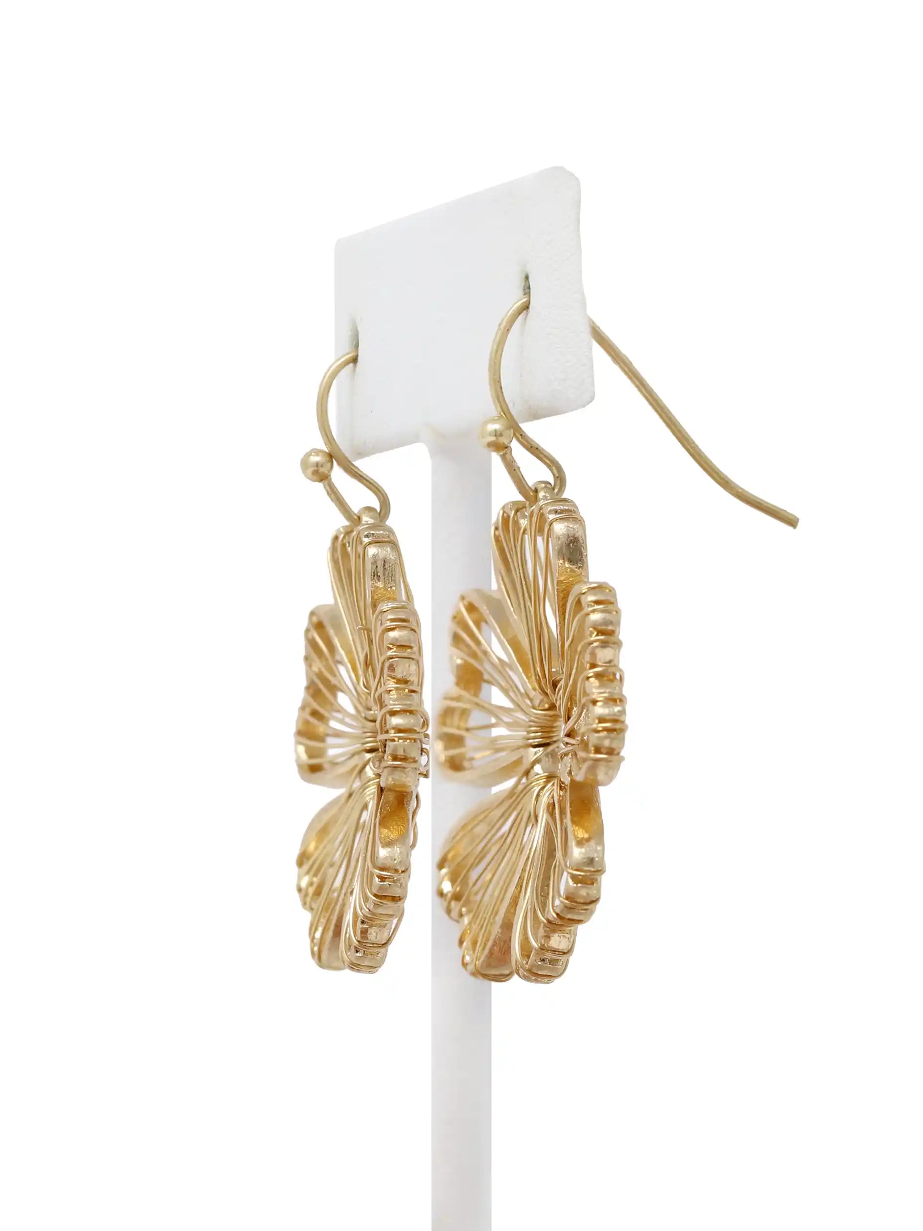 Gold wire flower drop earrings with open petal design and hook closure, featuring delicate floral filigree style in a lightweight gold-tone finish.