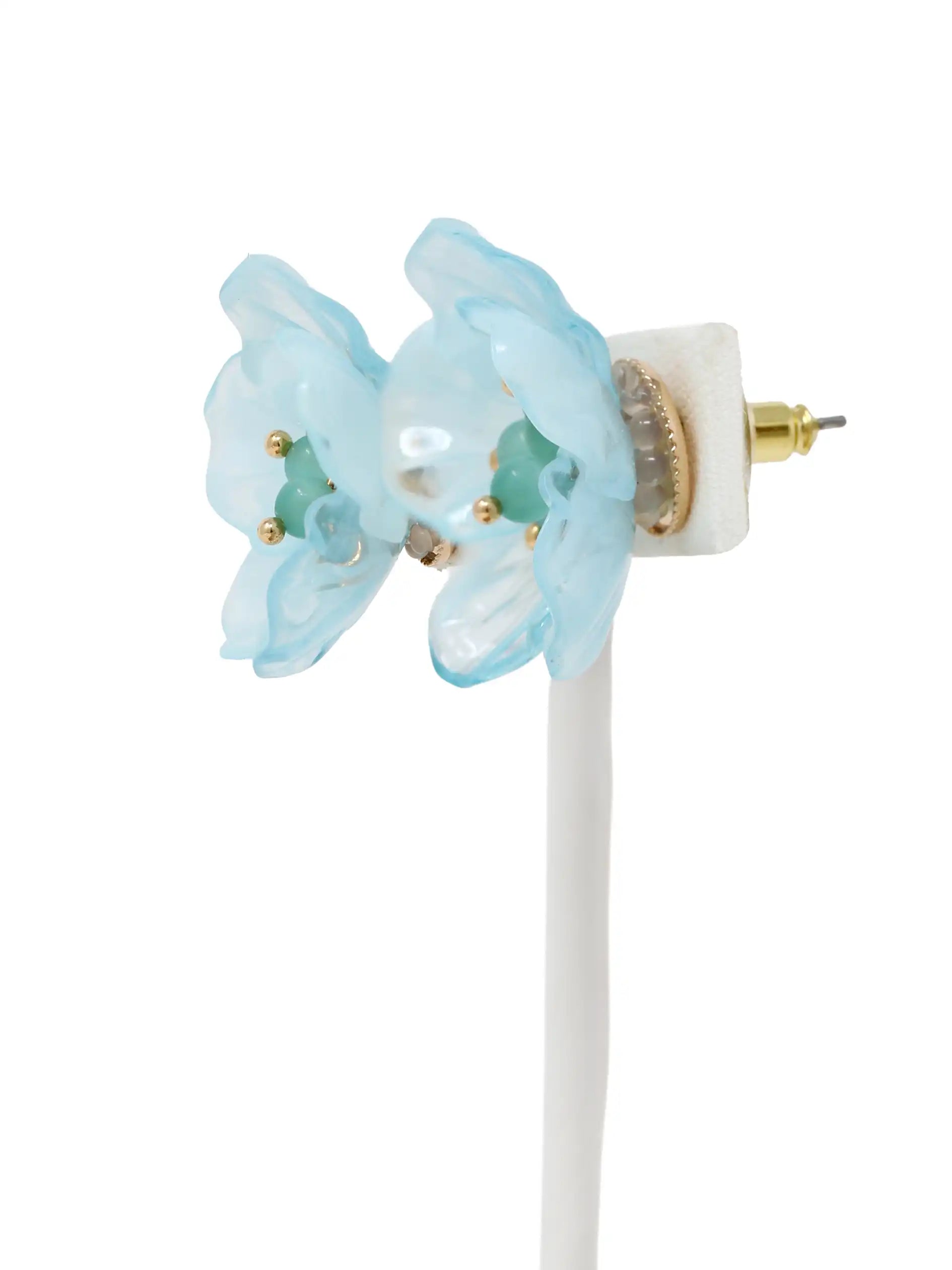 Light blue floral earrings with gold accents on a white background