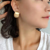 Gold bold statement earrings with hollow bold design.