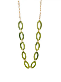 A gold-tone chain necklace featuring a series of linked, elongated oval rings in a translucent olive green color, displayed against a solid white background.