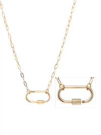 A gold chain necklace with a minimalist open oval carabiner, shown on a plain white background with a small inset detail view of the pendant.