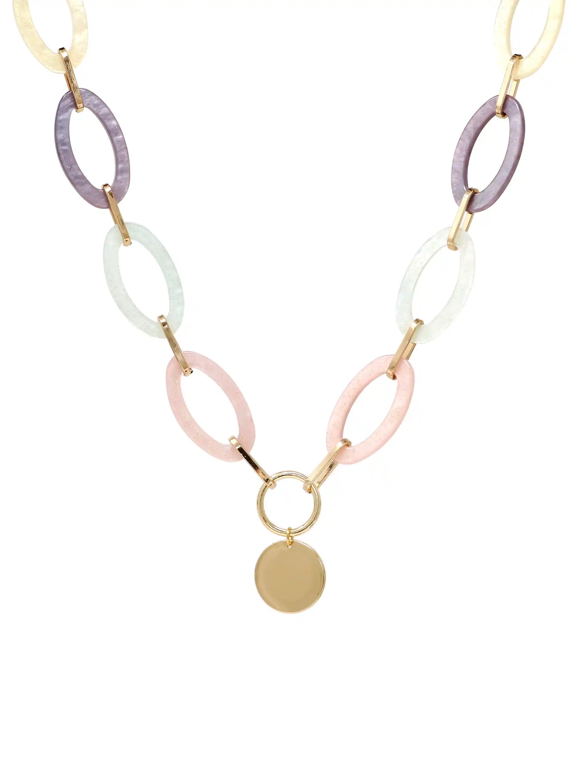 A statement necklace against a white background, featuring large, oval pastel multi colored resin links connected by gold-toned metal and a central, polished gold-toned circular pendant.
