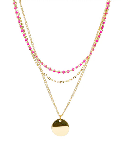 A gold layered necklace set featuring a long chain with small pink faceted beads, a shorter gold chain link necklace, and a flat round gold disc pendant, shown on a plain white background.