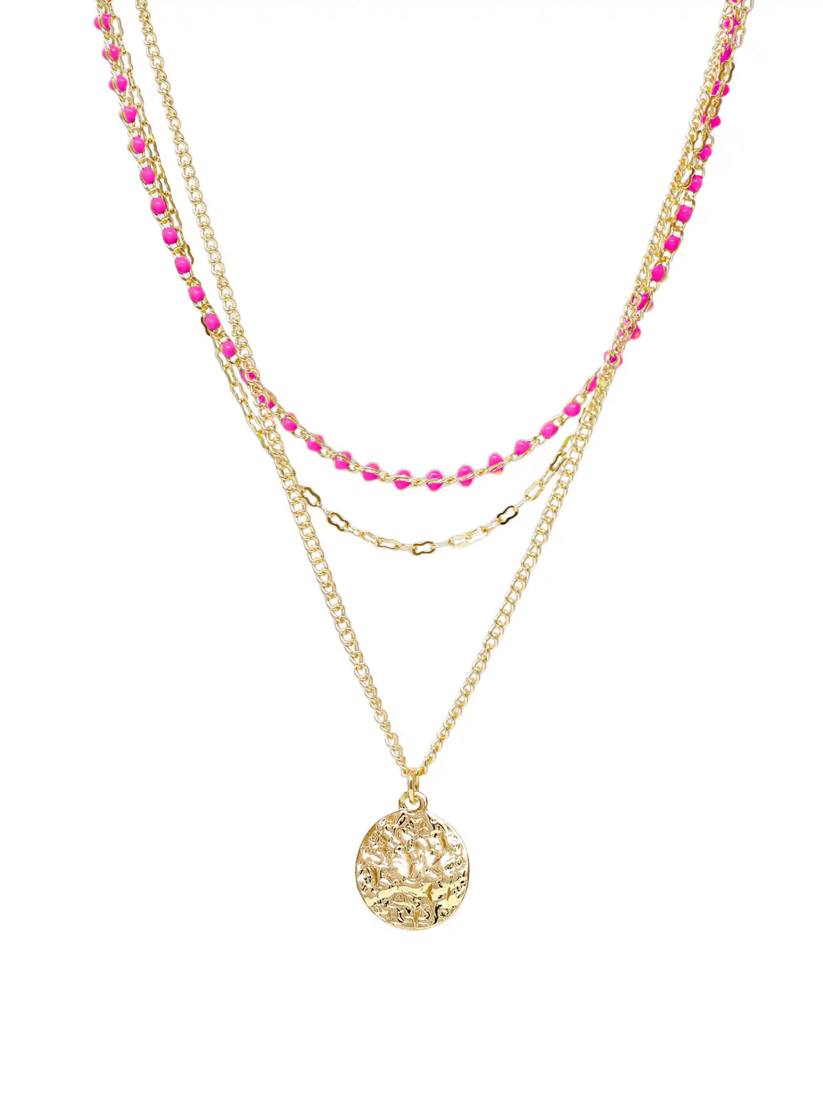 A gold layered necklace set featuring a long chain with a circular tree of life pendant, a medium chain with a small oval link accent, and a delicate chain embellished with bright pink faceted beads, all shown on a plain white background.