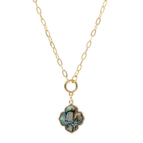 A short gold necklace featuring a natural abalone quatrefoil charm delicately dangled from a sleek and modern paperclip chain.