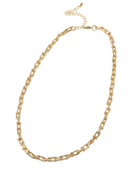 A bold gold link chain necklace with geometric links and polished bead connectors.