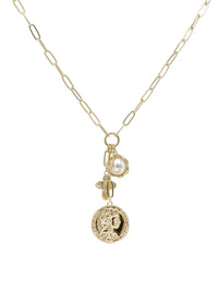 Gold necklace with charms on a white background
