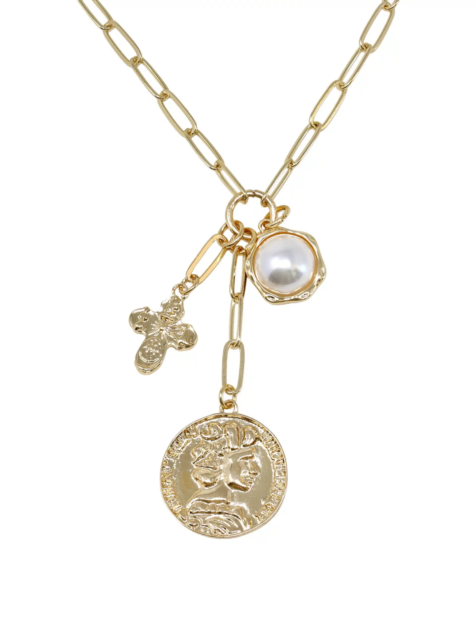 Gold necklace with various charms on a white background