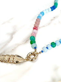 Colorful Glass Beaded Necklace with Gold Articulated Fish Charm