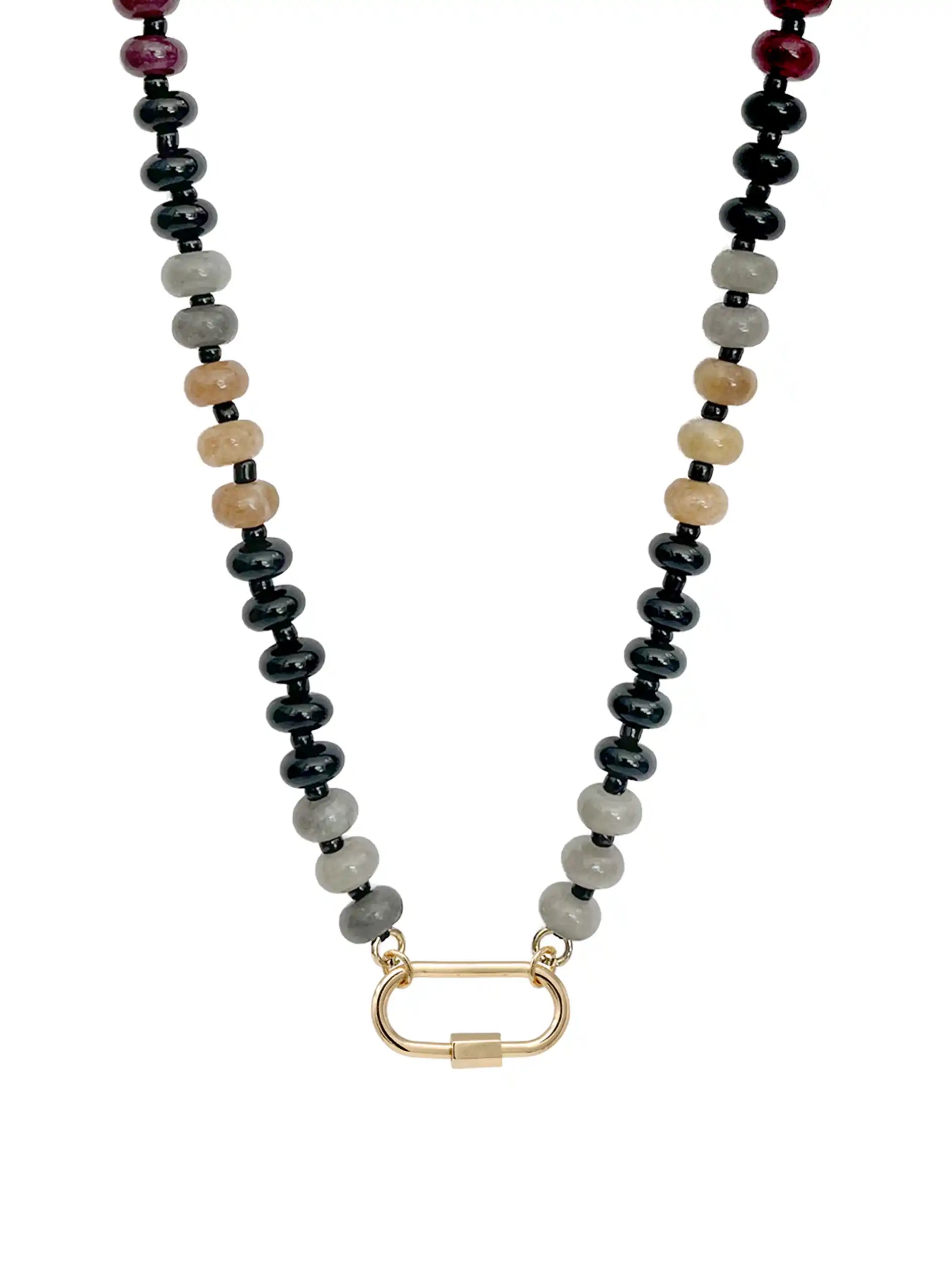 A natural semi-precious stone beaded necklace featuring black, gray, beige, and dark red round beads, with a gold-toned carabiner clasp, shown against a plain white background.