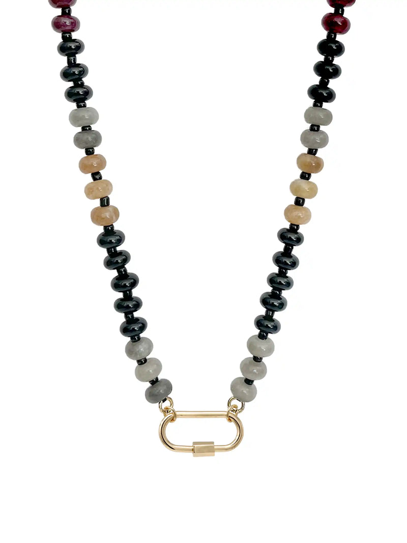 A natural semi-precious stone beaded necklace featuring black, gray, beige, and dark red round beads, with a gold-toned carabiner clasp, shown against a plain white background.