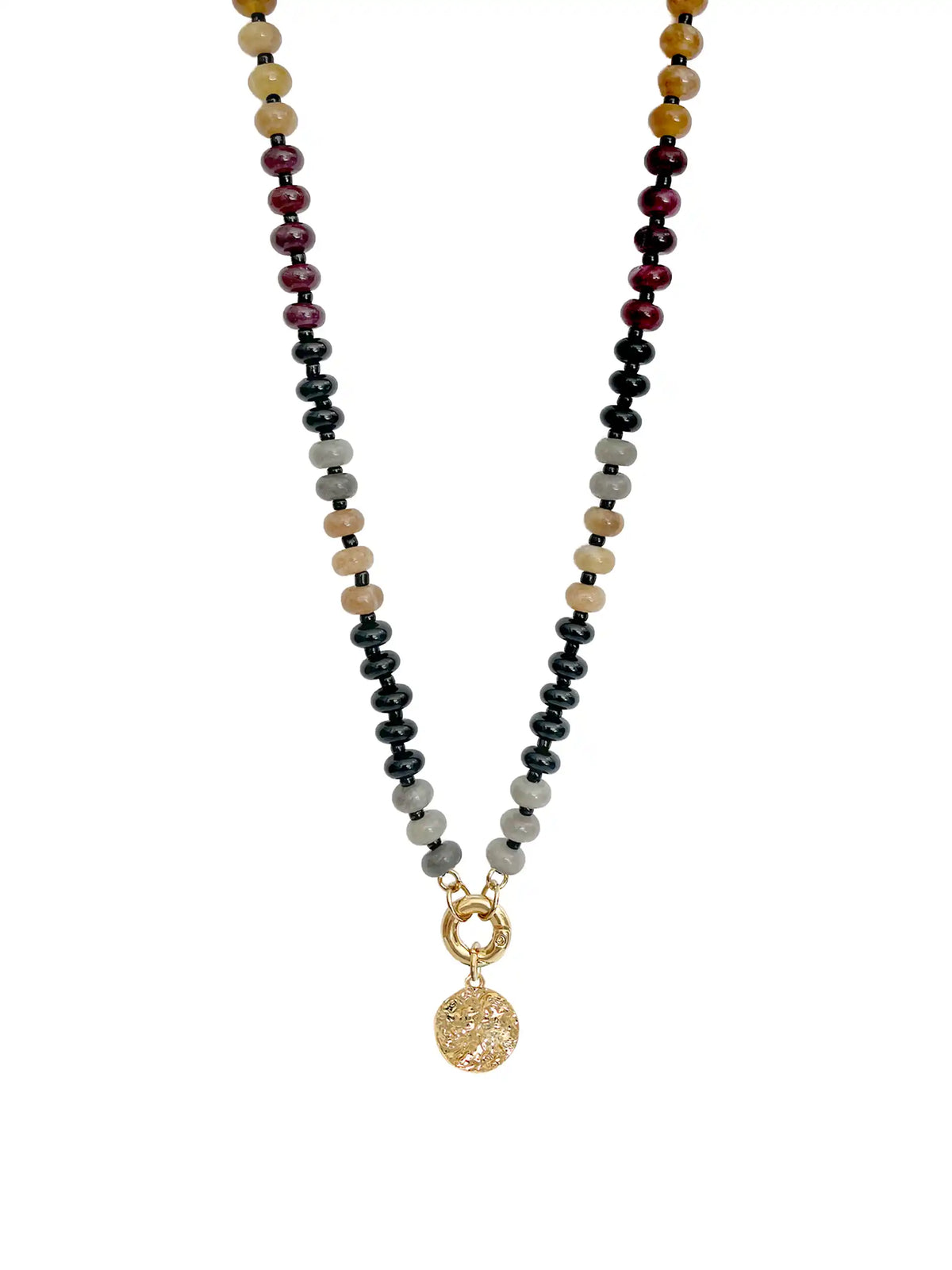 Black beaded statement necklace with mixed brown and dark red beads, gold-tone clasp, and textured round coin pendant on a white background.